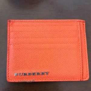 Orange Burberry card holder.